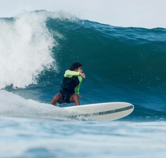 Longboarder enjoying the stoke in Nosara